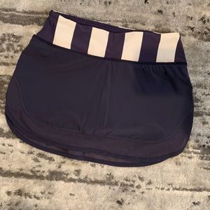 LULULEMON SKORT. NEVER WORN. Size 2. Beautiful eggplant color